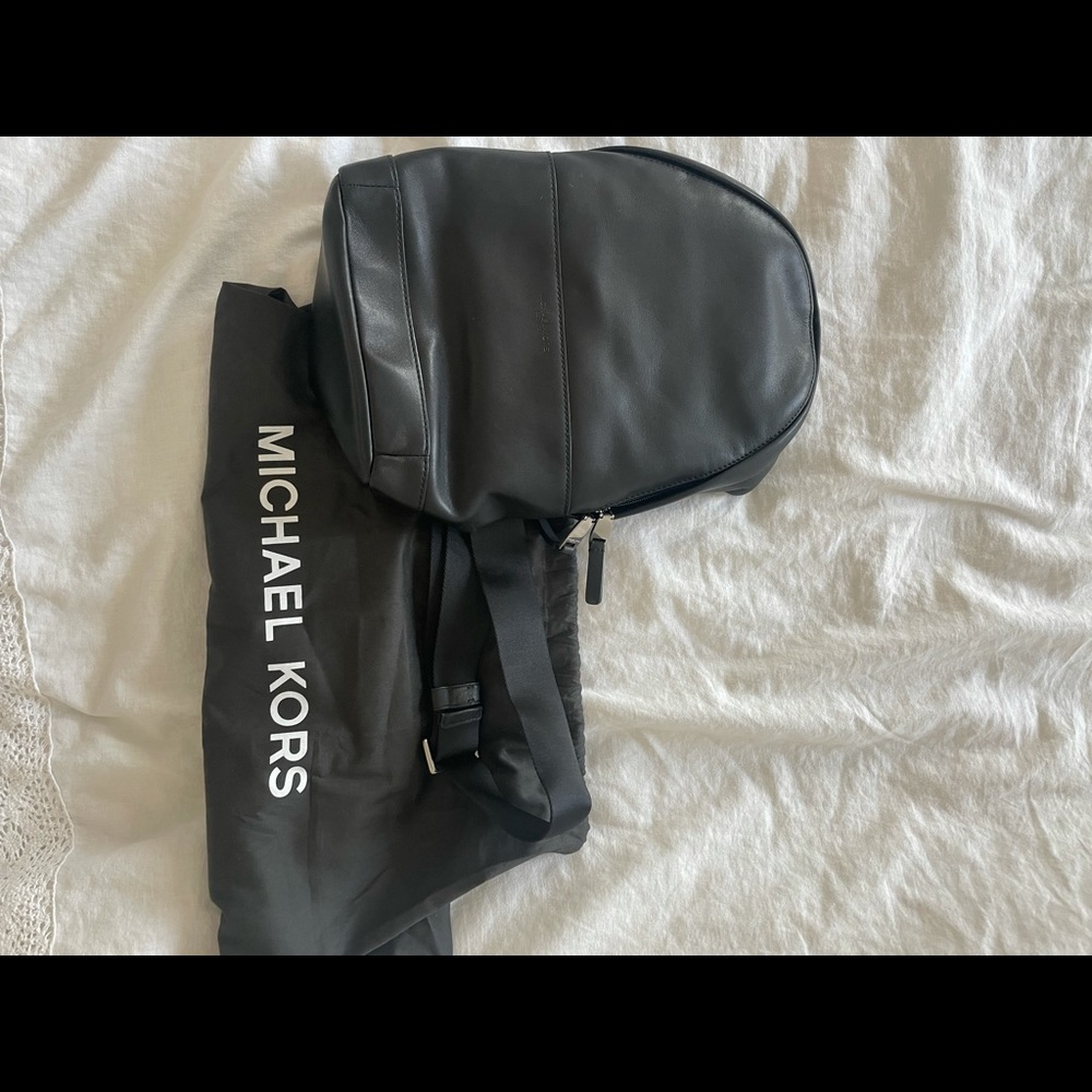 Black leather Michael Kors single strap backpack/crossbody